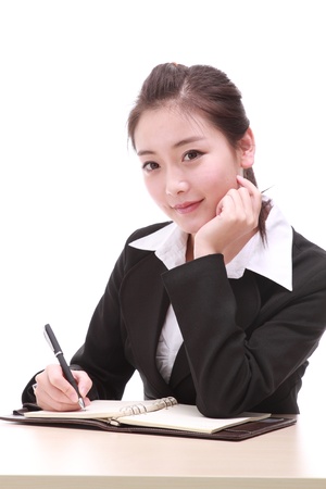 young businesswoman with penの写真素材