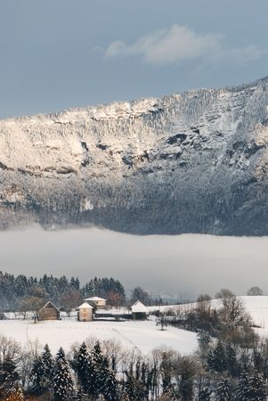 Mountain landscape in the surroundings of a village in the Alps.の写真素材