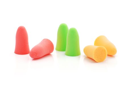 Multicolored earplugs isolated on a white background