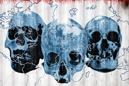 Drawing of three blue skulls and world cartography on corrugated ironの写真素材