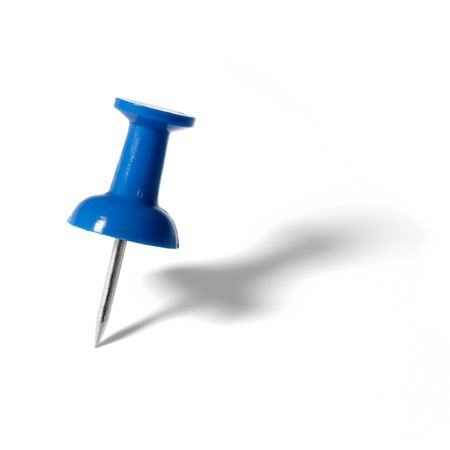 Blue push pin with shadow isolated on whiteの写真素材