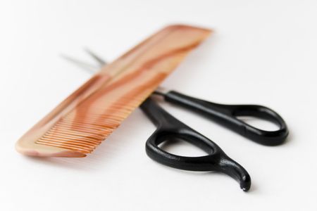 Scissors and hairbrush