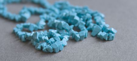 Blue beads on the greyの写真素材