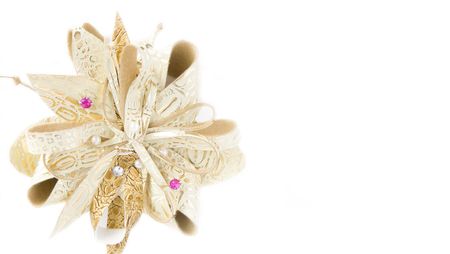 Gold bow isolated on whiteの写真素材