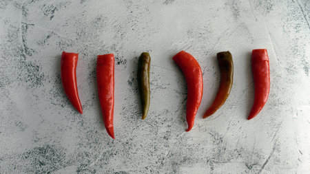 red hot chili pepper on light concrete background