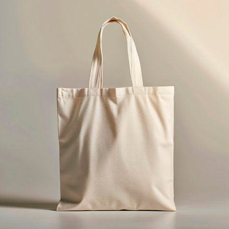 Beige fabric bag on light backgroundの素材