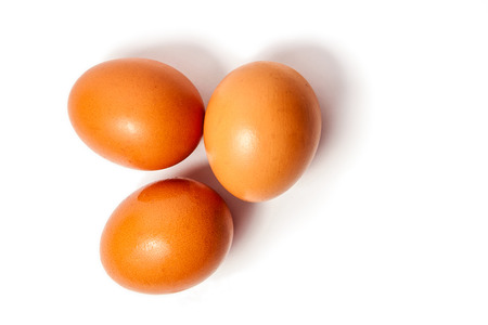 Three eggs on the white backgroundの写真素材