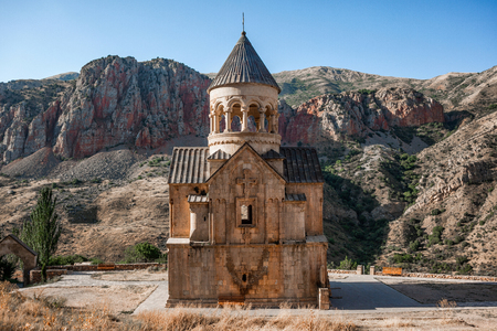 Beautiful ancient armenian monastery between the mountains and red cliffs Noravankの写真素材
