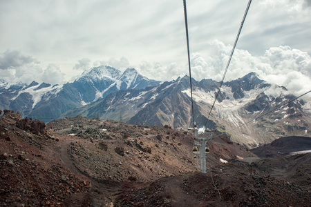 Russia, Elbrus. Cable car in the ski resort, view of Caucasus mountainsの写真素材