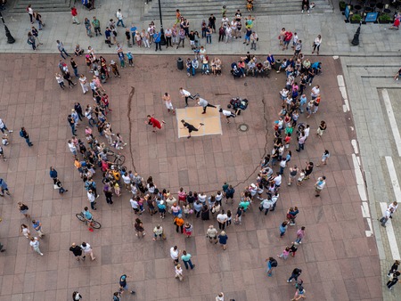 Warsaw, Poland - July, 2017: Aerial view of the old city in Warsaw and dancing people on the squareのeditorial素材