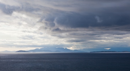 picturesque landscape with the sea, mountains, cloudsの写真素材