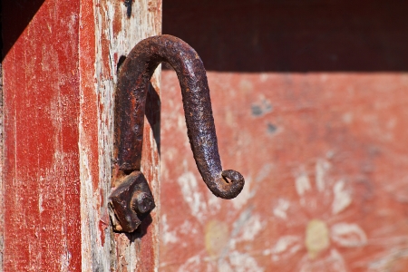 texture of the wood with a rusty hookの写真素材