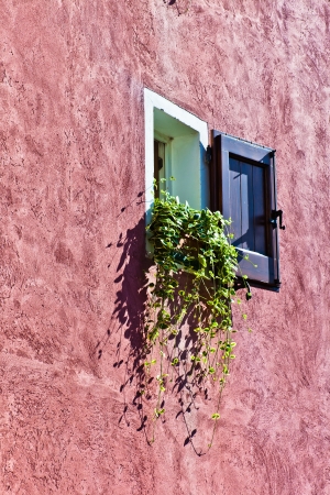 The beautiful facade of the house with a windowの写真素材