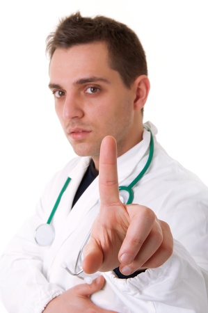 Male doctor with finger pointing at viewerの写真素材