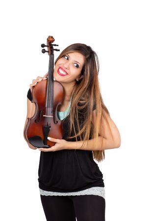 Funny beautiful woman holding her violin isolatedの写真素材