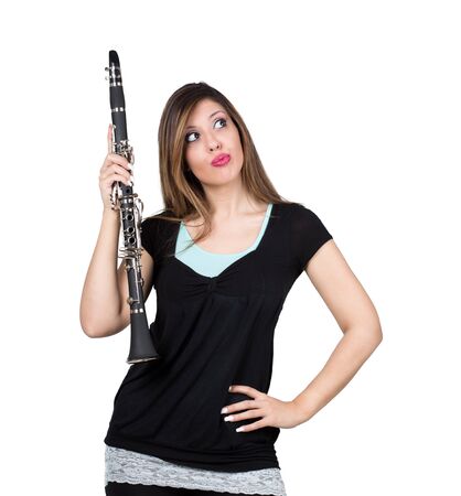 woman perplexed with her clarinetの写真素材