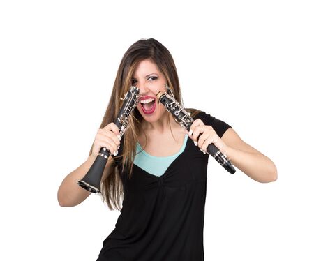 Crazy woman with clarinet divided in halfの写真素材