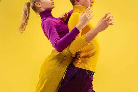 Portrait of two friends going crazy, having fun. Bright clothes, trendy colors.の写真素材