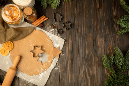 Baking ingredients - flour, rolling pin, gingerbread, candied fruit, cinnamon.の写真素材