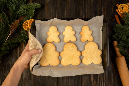 Tray with Christmas gingerbread men. Holiday, family, home comfort concept.の写真素材