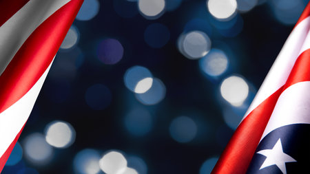 American flags border over defocused blue bokeh lights background. Flyer.の写真素材