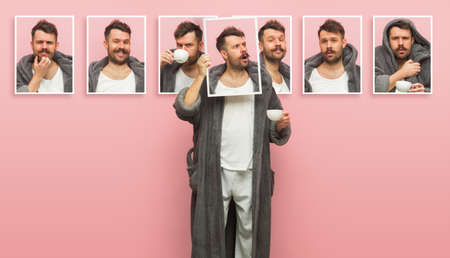 Young man showing portraits with different emotions isolated on pink background.の写真素材