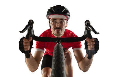 Close-up professional male cyclist on road bike isolated on white background.