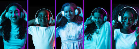 Collage of five young African female models isolated on dack background in neonの写真素材