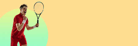 One Caucasian man, professional tennis player isolated on yellow green background. Flyer, magazine styleの写真素材