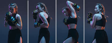 In motion. Young female MMA fighter posing isolated over pink gray background in neon light. Flyerの写真素材