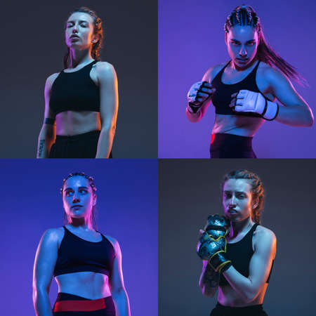 Two young female MMA fighters posing isolated over gray purple background in neon light. Flyerの写真素材