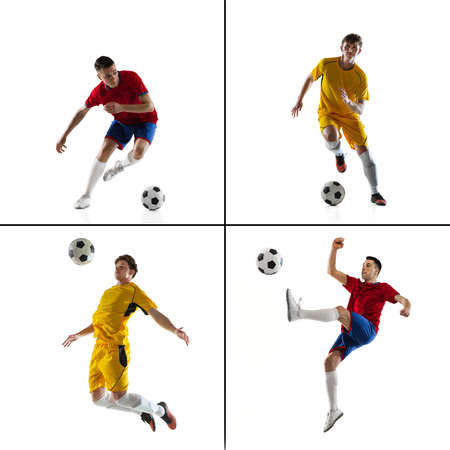 Two soccer footbal players, professional sportsmen training isolated over white background.の写真素材