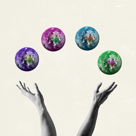 contemporary artwork. Human bw hands holding four colored images of the Earth. Concept of saving nature.の写真素材