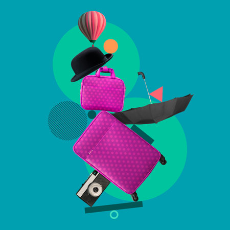 Travelling. Creative static composition with suitbags and camera over dark green background.の写真素材