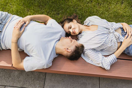Portrait of young beautiful woman taking selfie outdoorの写真素材