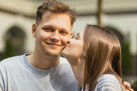 Close-up portrait of young beautiful couple on sunny summer dayの写真素材