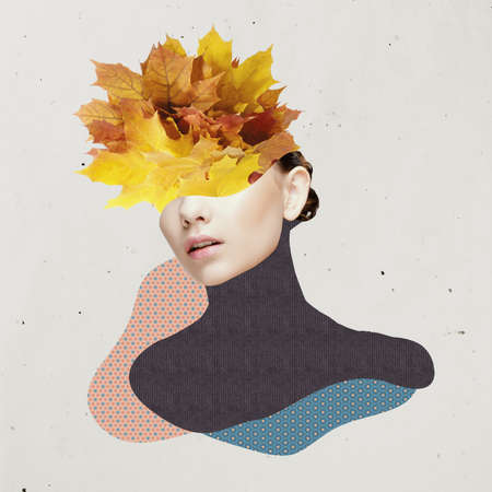 Young beautiful girl with autumn leaves. Autumn beauty aesthetic. Artworkの写真素材
