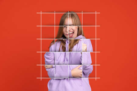 Puzzle effect artwork of young beautiful caucasian girl showing different emotions isolated over red...