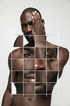 Creative art collage of young african man isolated over white background. Puzzled face on bodyの写真素材