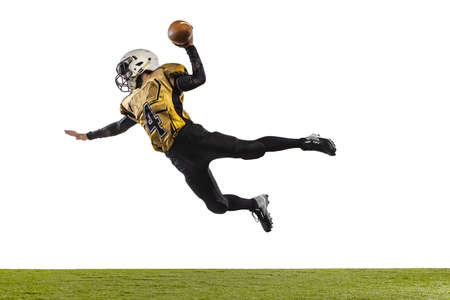 One professional american football player in special uniform training isolated over white grass...