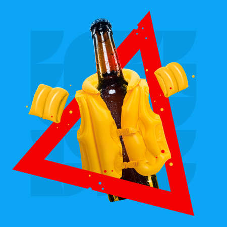 Contemporary art collage. Bottle of cold beer in life vest in red triangle isolated over blue backgroundの写真素材