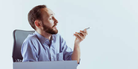 Motivated and ambitious employee working on new business project in the office. Concept of work,...
