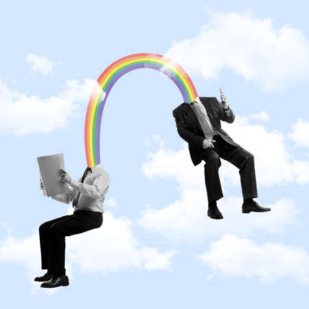 Contemporary art collage of two working employee with rainbow head isolated over blue backgroud with cloudsの写真素材