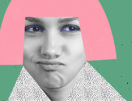 Contemporary art collage of woman with drawn hair and cloth elements making faces isolated over green backgroundの写真素材