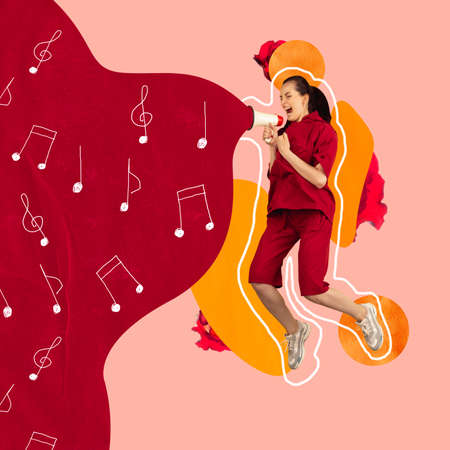 Contemporary art collage of excited joyful woman jumping and singing in megaphone isolated over red backgroundの写真素材
