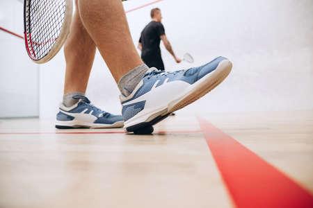 Close-up image of special sportswear, sneakers for playing squash gameの写真素材