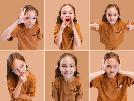 Collage of portraits of beautiful little girl showing differents emotions, facial expressions isolated over light brown backgroundの写真素材