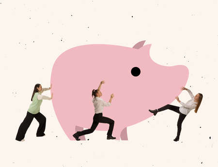 Contemporary art collage. Employees pushing giant piggy bank symbolizing savingsの写真素材