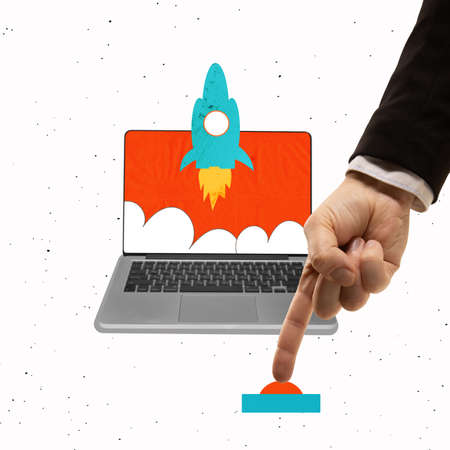 Contemporary art collage. Hand pressing button symbolizing new project launchingの写真素材