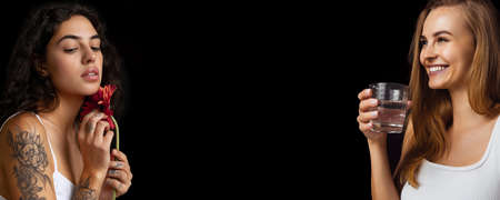 Collage of two beautiful tender young women posing in underwear isolated over black background. Flyerの写真素材